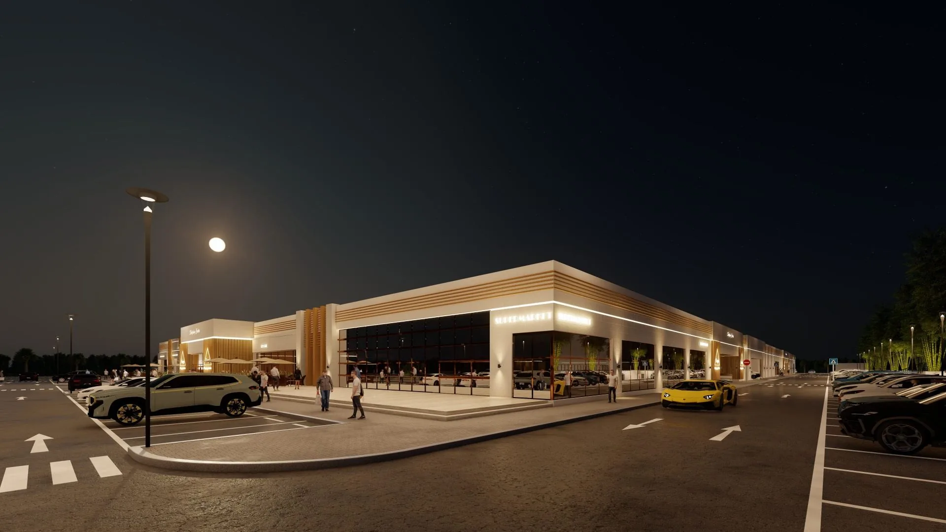 Mizn Avenue entrance portico illuminated at night — Al Mizn, Abu Dhabi